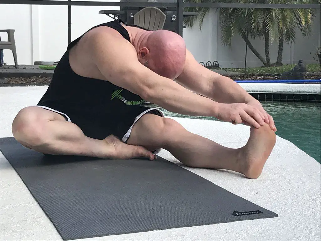 Hamstring hurdle stretch after leg day