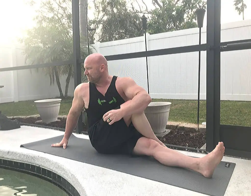 Spinal twist pose - yoga for bodybuilders and weightlifters